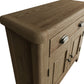 Close view on a small oak sideboard top, rounded corners and edges