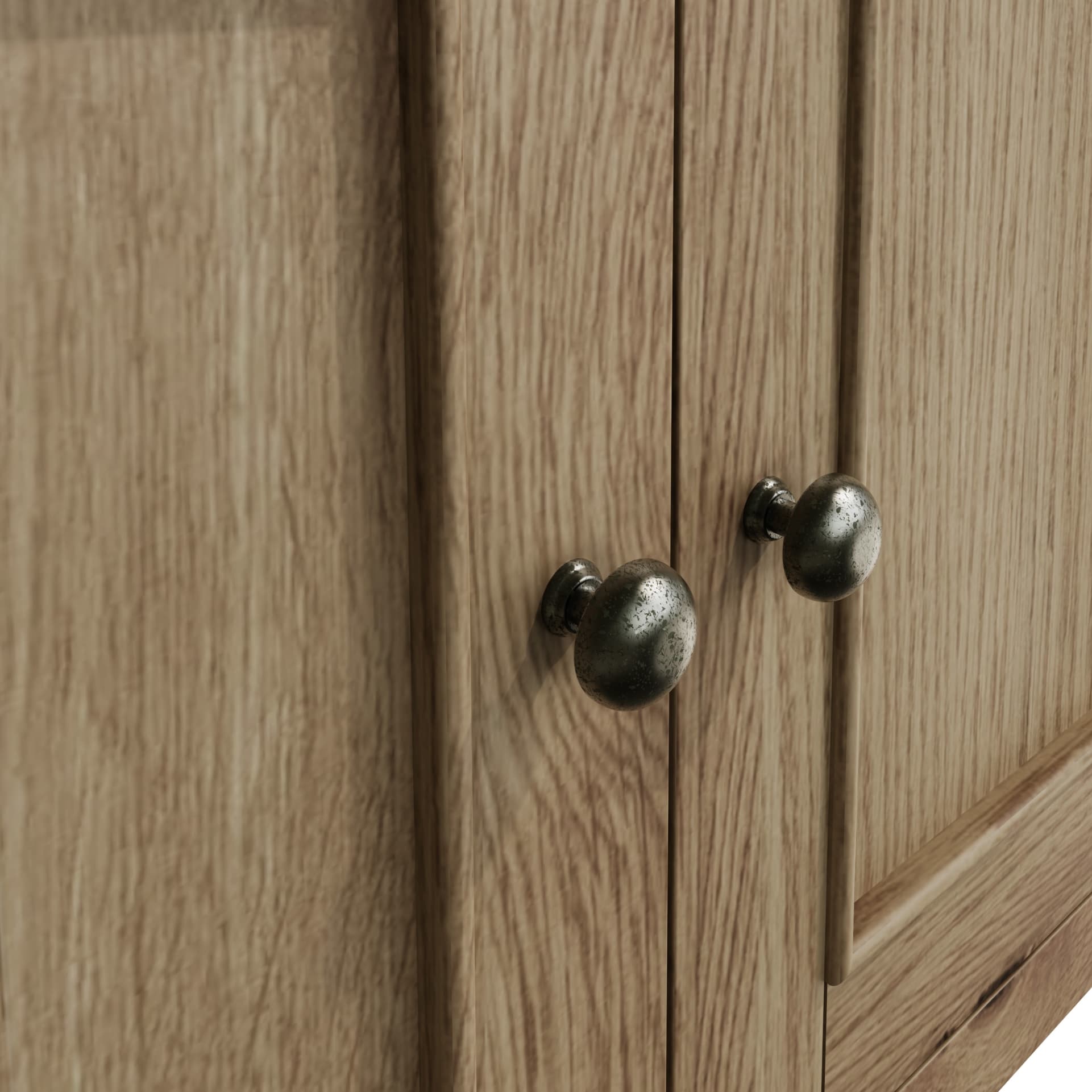 Close view on door decor and round handles in antique finish of the sideboard