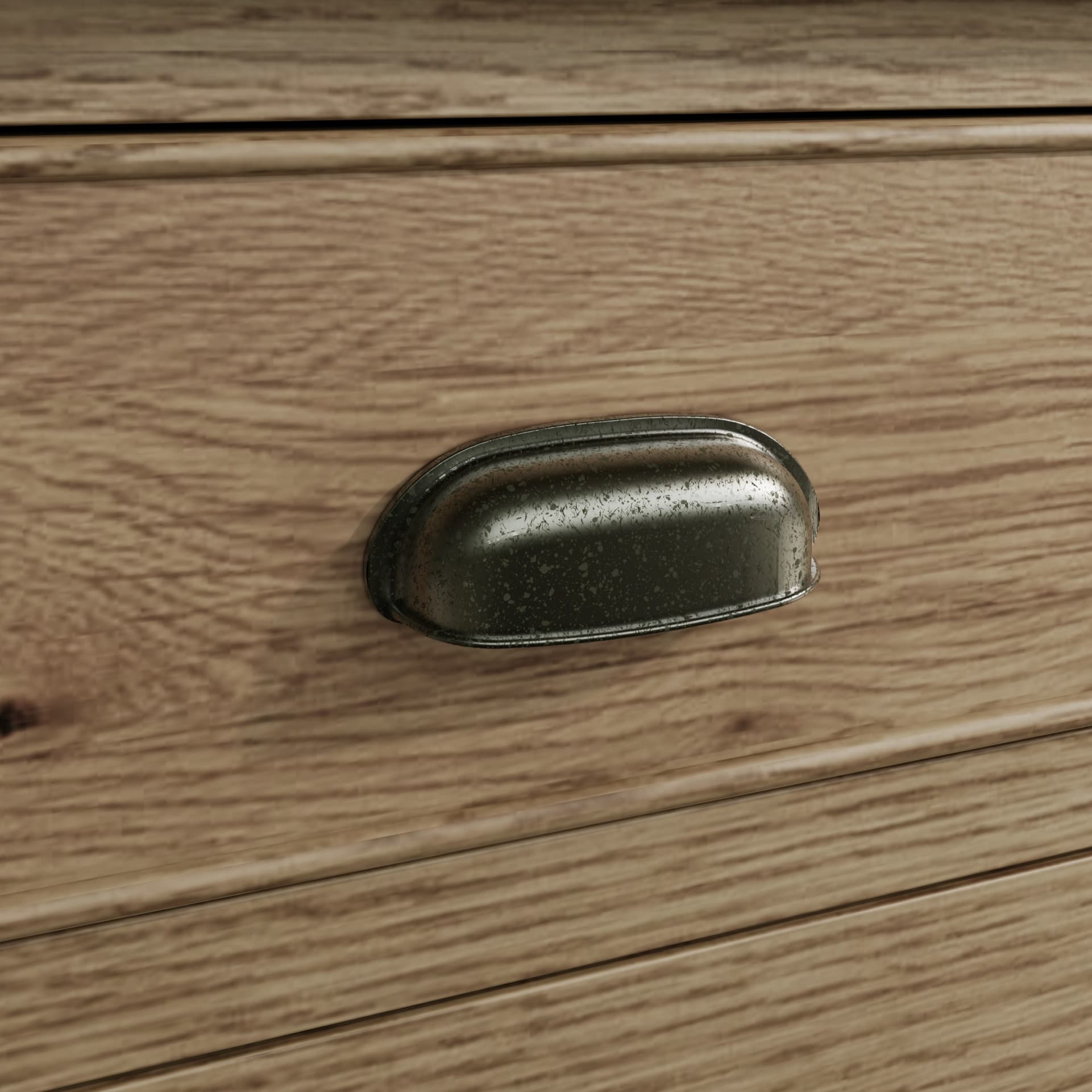 Close view on oak sideboard drawer handle in antique finish