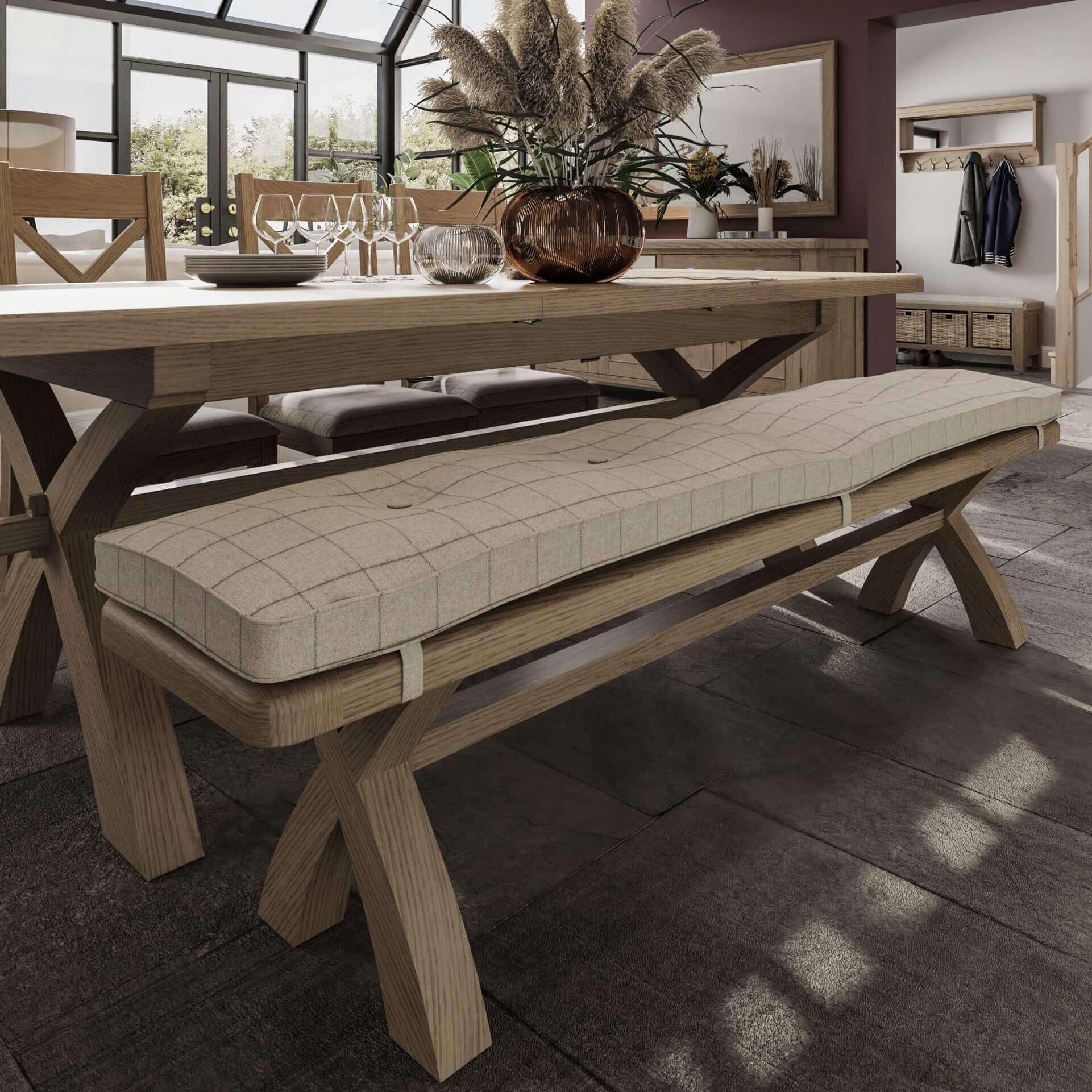 Beige check wool tufted bench cushion fitted to oak dining bench shown in room setting