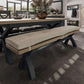 Beige check wool tufted bench cushion fitted to oak and blue dining bench shown in room setting