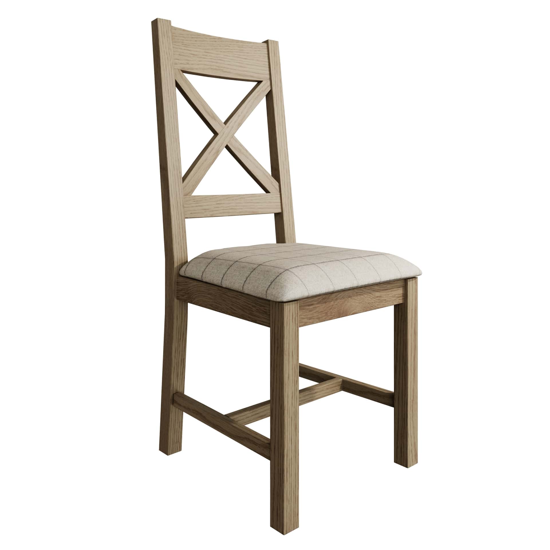 Oak cross back dining chair with beige padded seat. Product only view at an angle