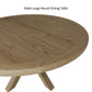 Close view from above on table top of large oak round dining table 