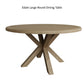 Close view on large round dining table in smoked oak colour with spider legs