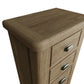 Close view on the edges, corners and finishes of the narrow chest of drawers