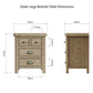 Large oak bedside table is shown from 2 sides with dimension details