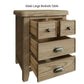 Large wooden bedside cabinet is shown with 4 drawers open revealing dovetailed design and slider mechanism