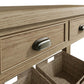 Close view on cup handles of the drawers with antique effect and wicker baskets