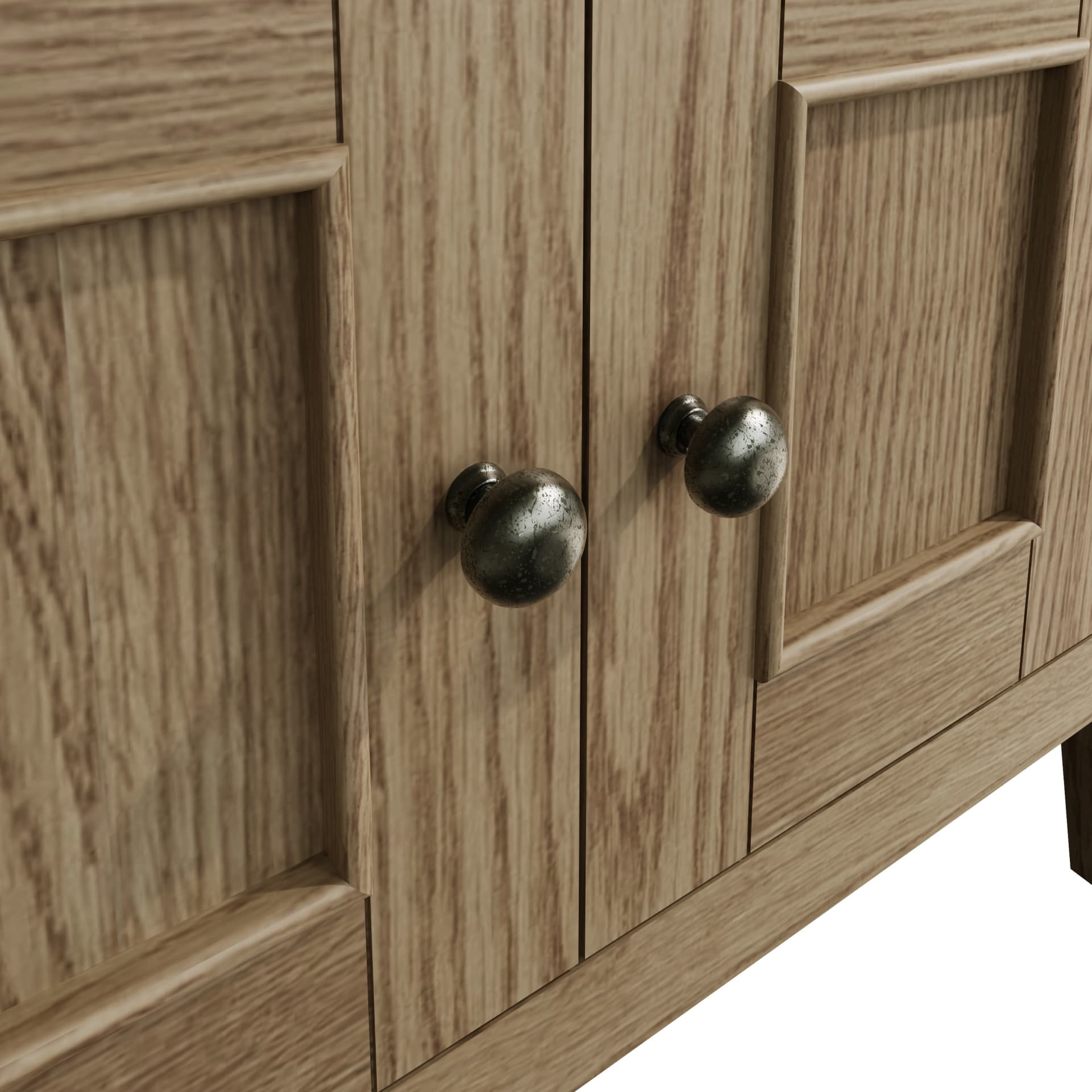 Cabinet door knobs with antique effect are shown close