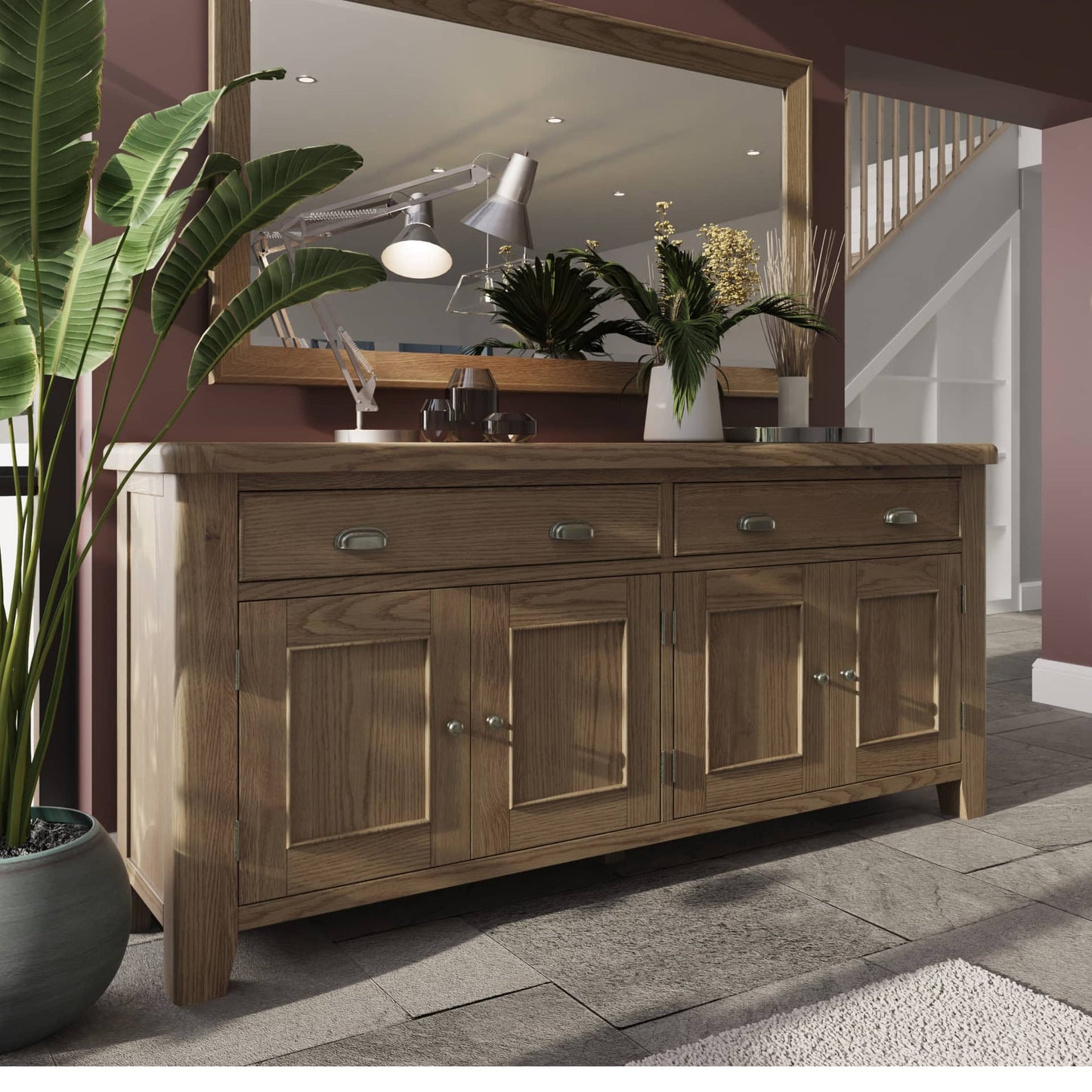 Large 4 door 2 drawers sideboard in smoked oak colour in a room setting with decor on top