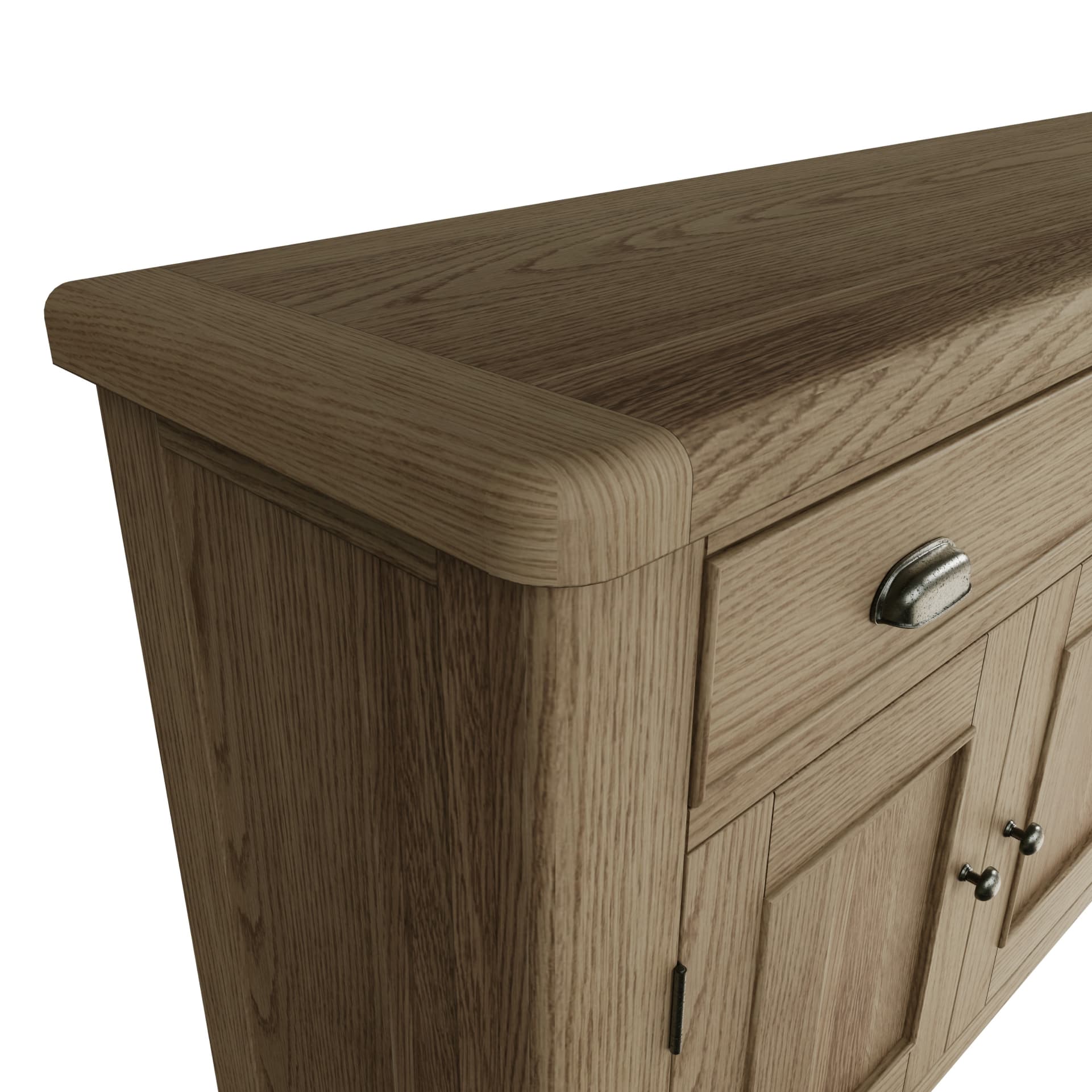 Close view on the chunky top and rounded corners and edges of the large oak sideboard