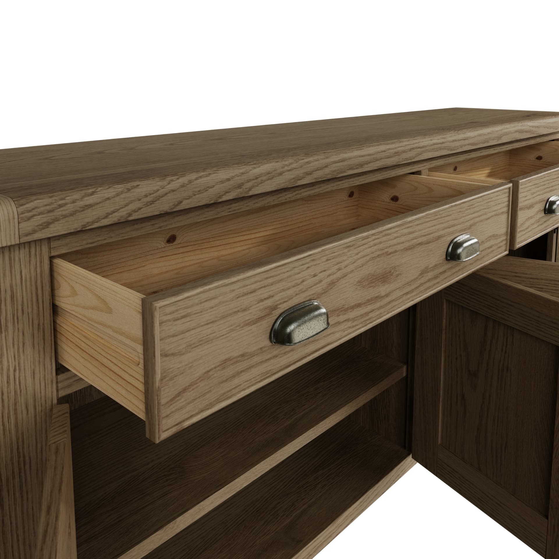 Close view on two large open drawers and cup drawer handles with antique effect. 