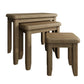 Close view on nesting side tables with tapered legs