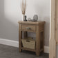 Oak Telephone Table with Storage is shown in a room setting with landline phone and decor on top