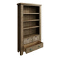 Large oak bookcase is shown with open drawer to showcase storage