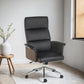 black high back office chair with gull wing arms shown in AI engineered room setting