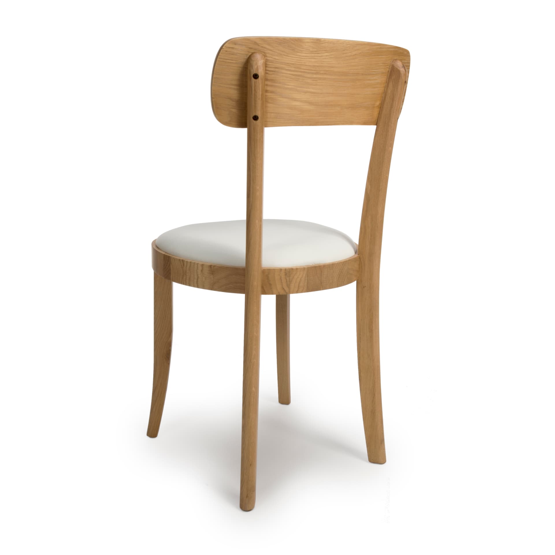 back side view on the oak dining chair with tapered legs and curved backrest