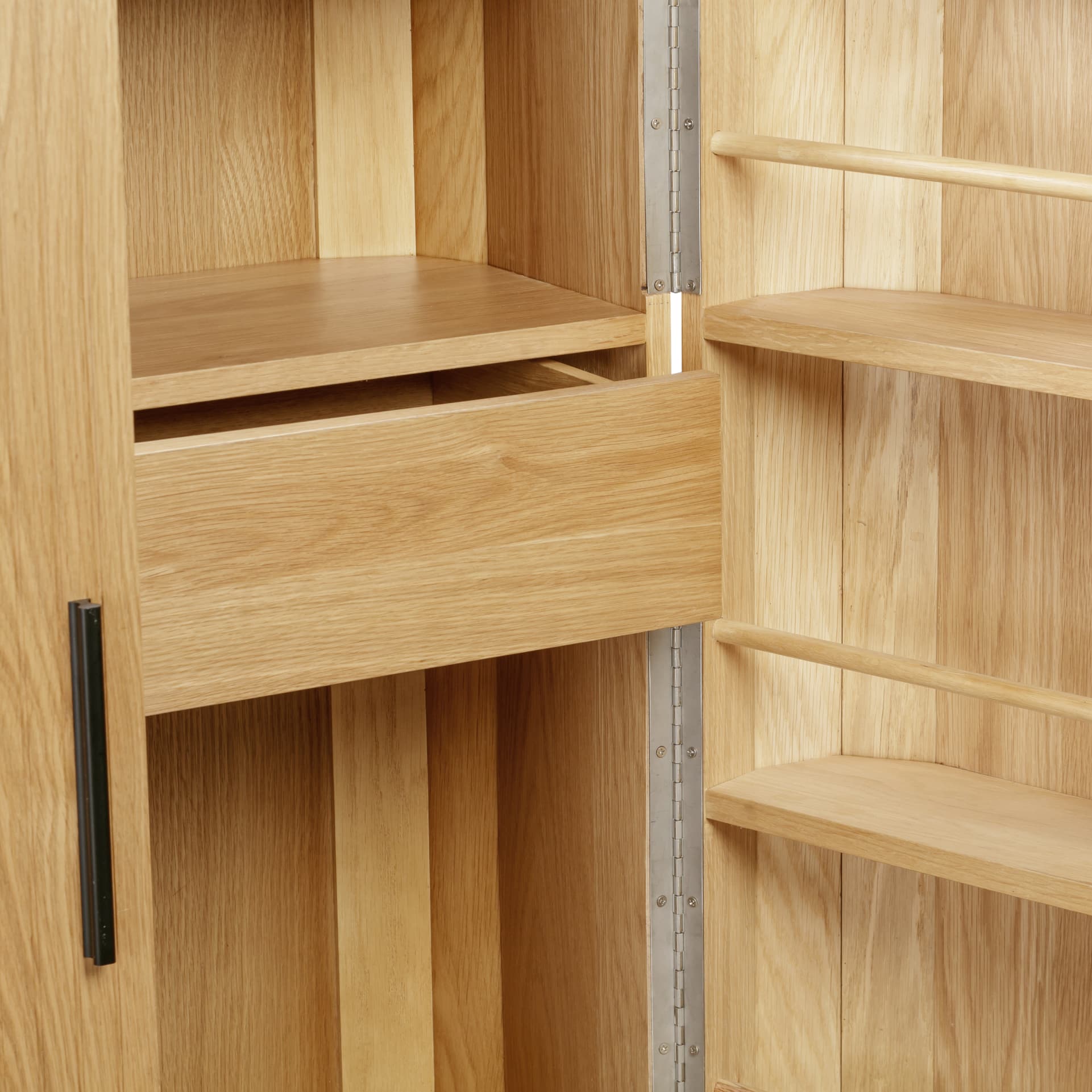 close look on inside storage and finishes of the drinks cabinet