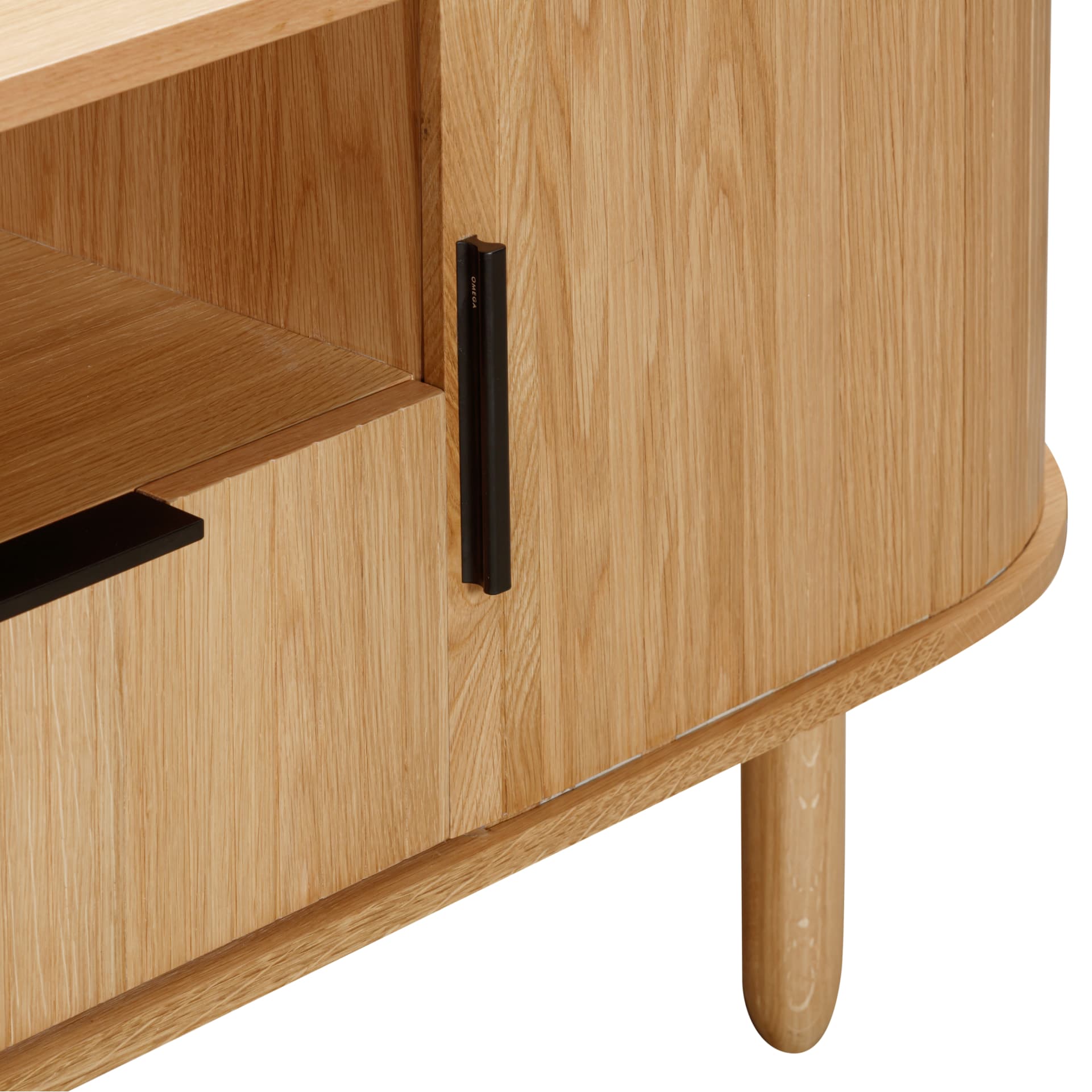 close look on finishes, handles, tapered legs and slatted sliding doors of a wooden tv unit