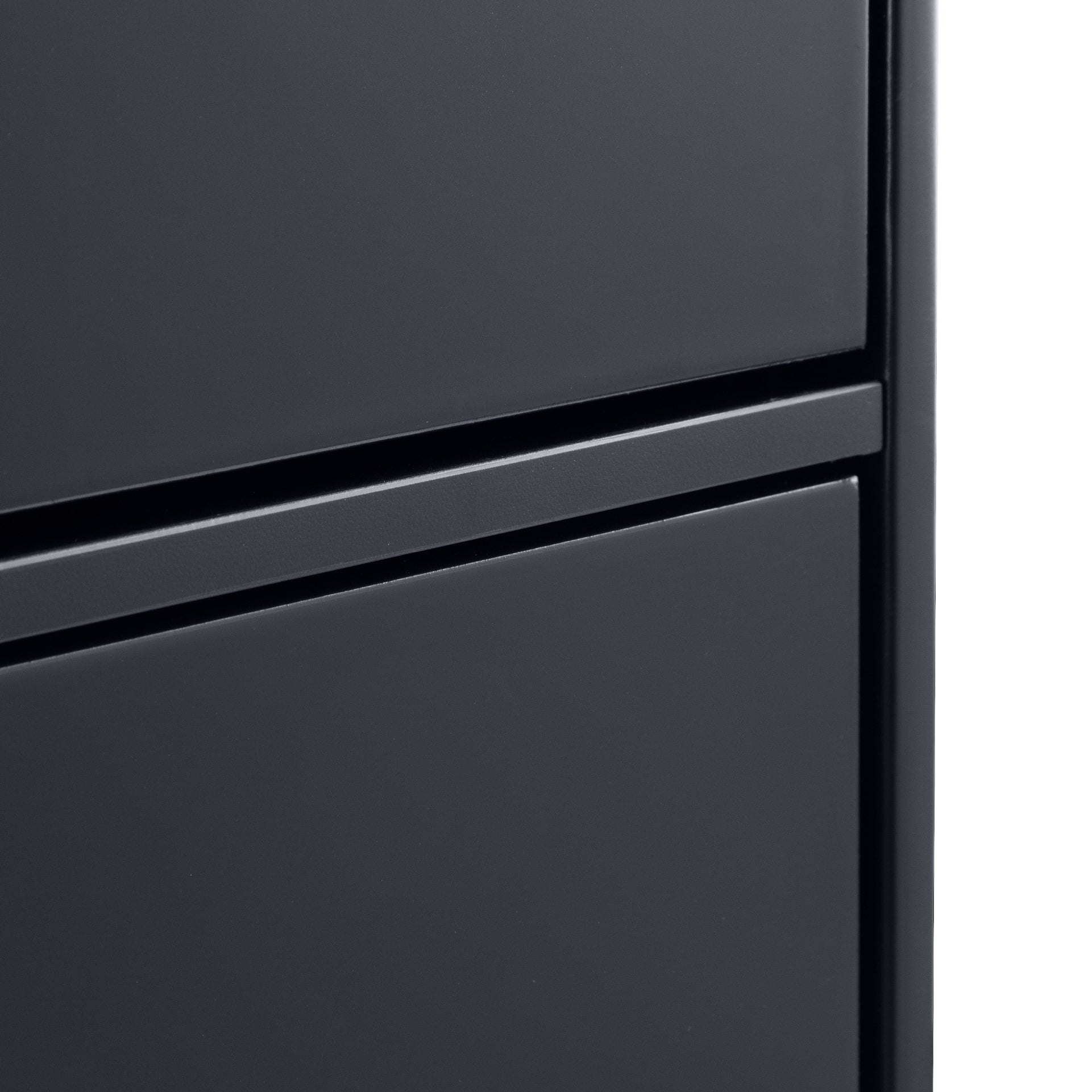 close look on finishes and edges of the black wardrobe