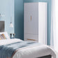 2 door white wardrobe with recessed oak coloured handles is shown in the bedroom near the bed