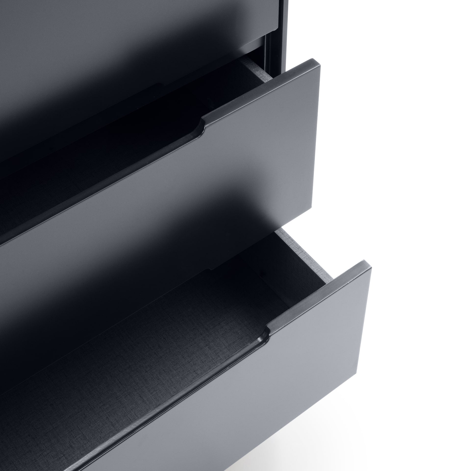 close look on open drawers of a wide chest