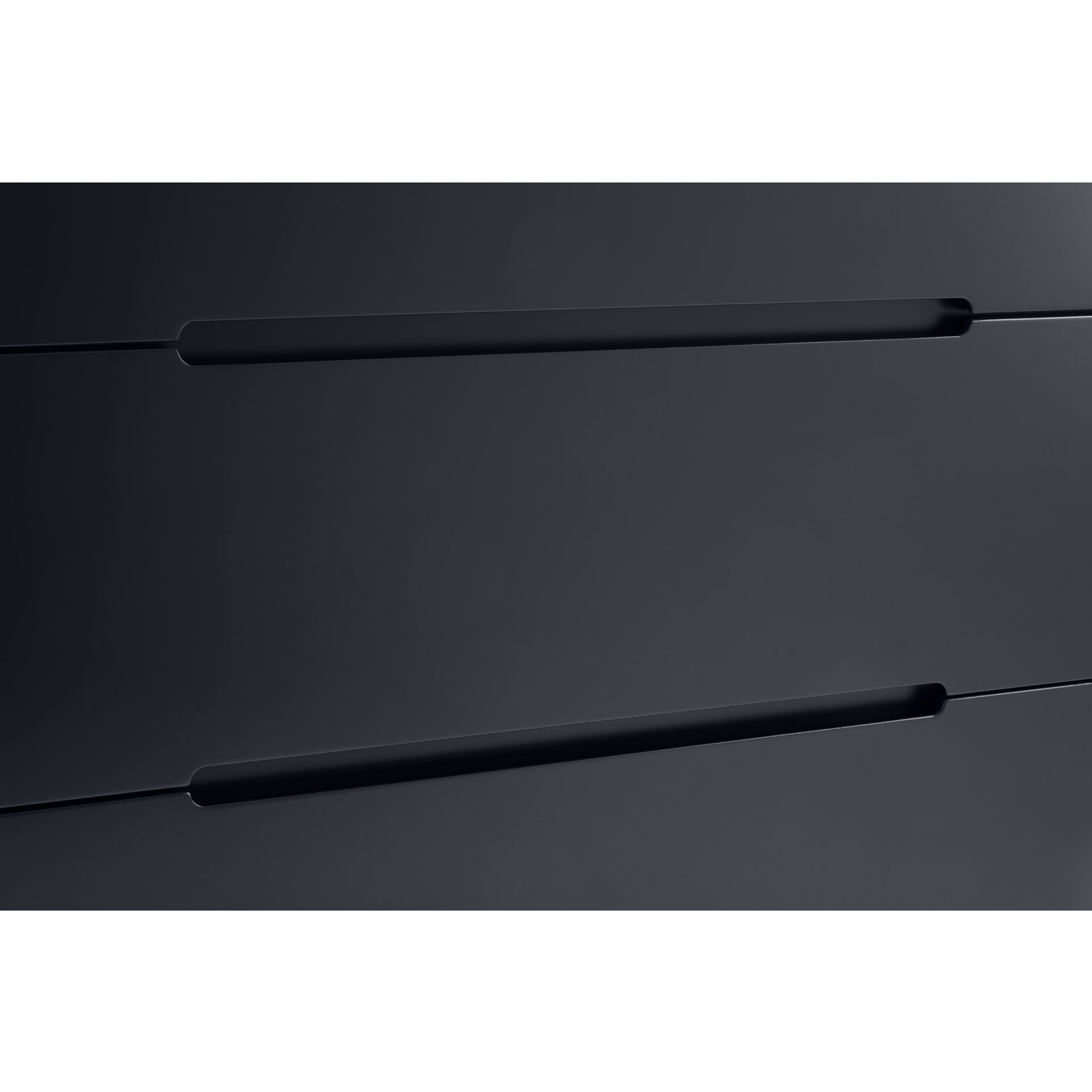 Close look on recessed handles and finishes of the anthracite black chest of drawers