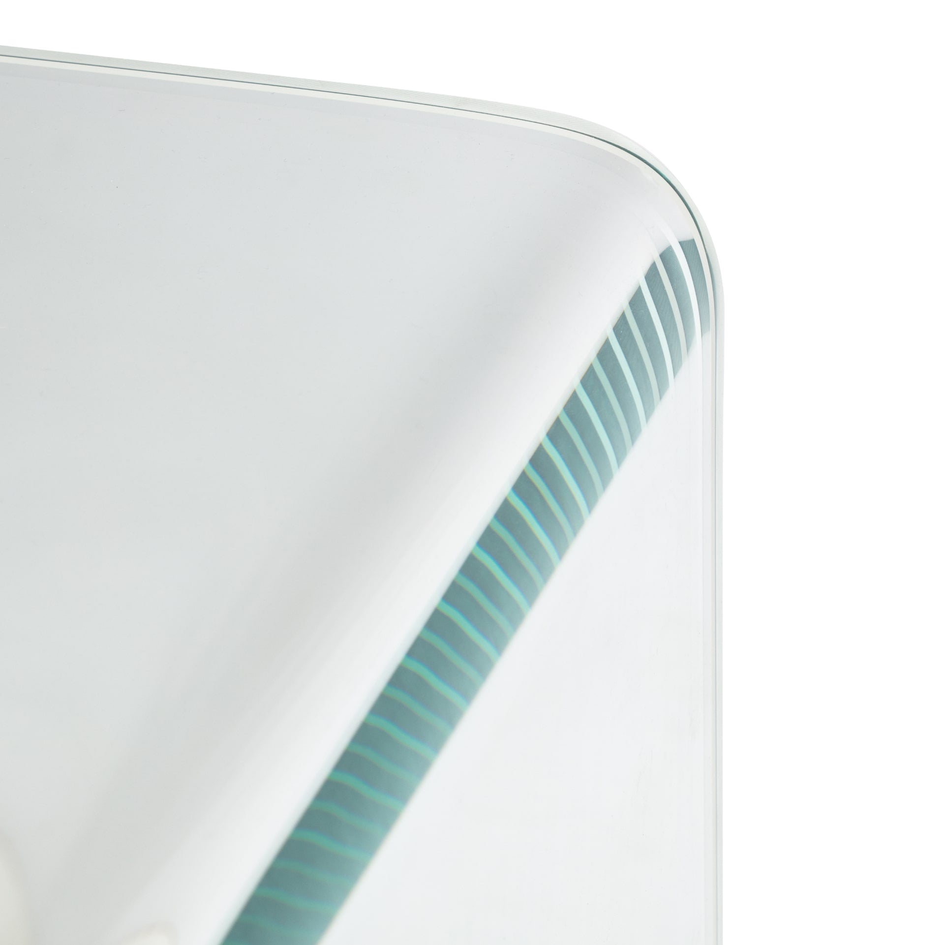 Close look on curving edge of the bent glass coffee table