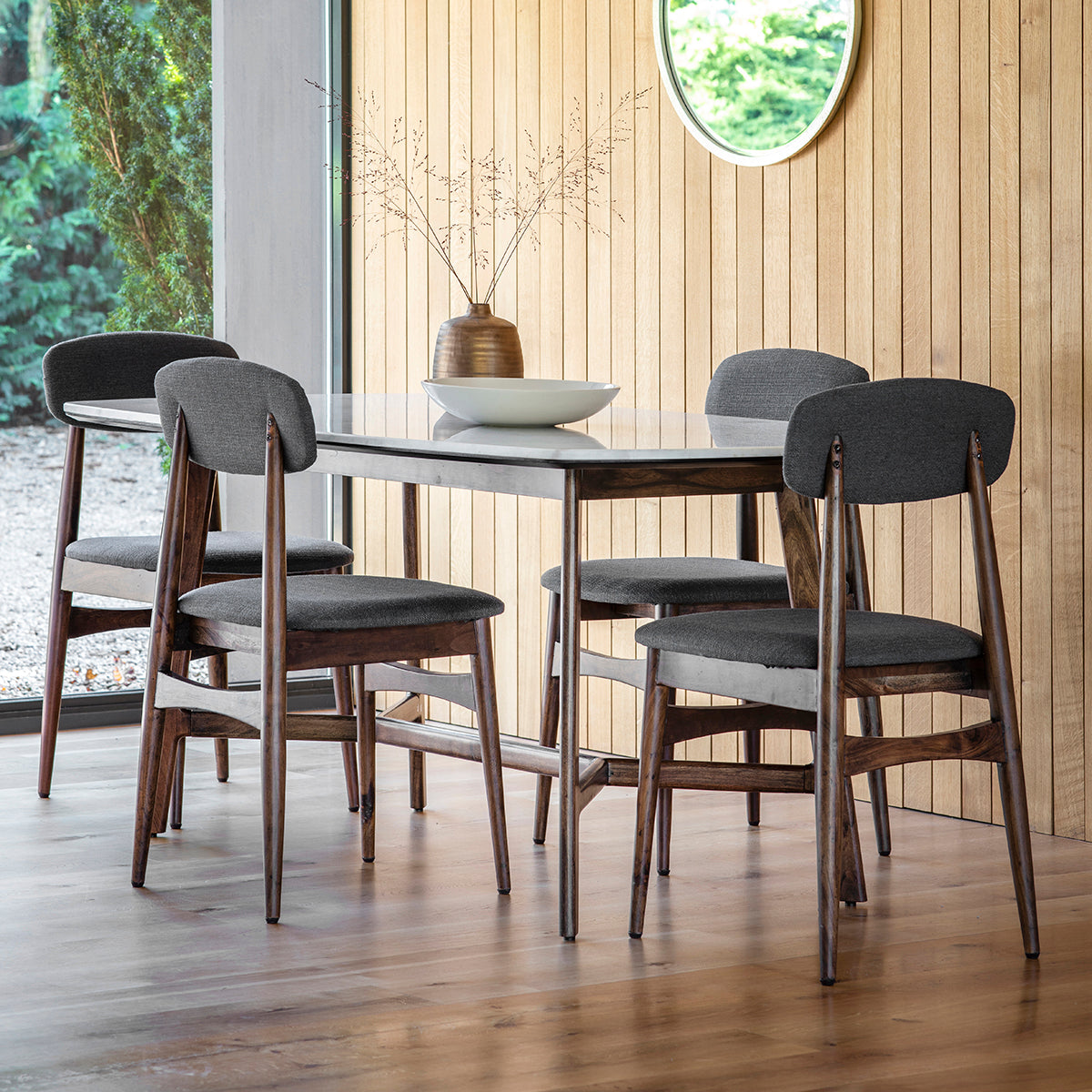 Four Andalusia Dining Chairs with the dining table in the room setting