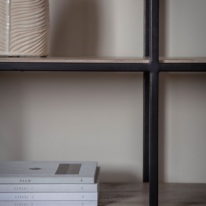 Shelves and matte black metal structure frames close-up view