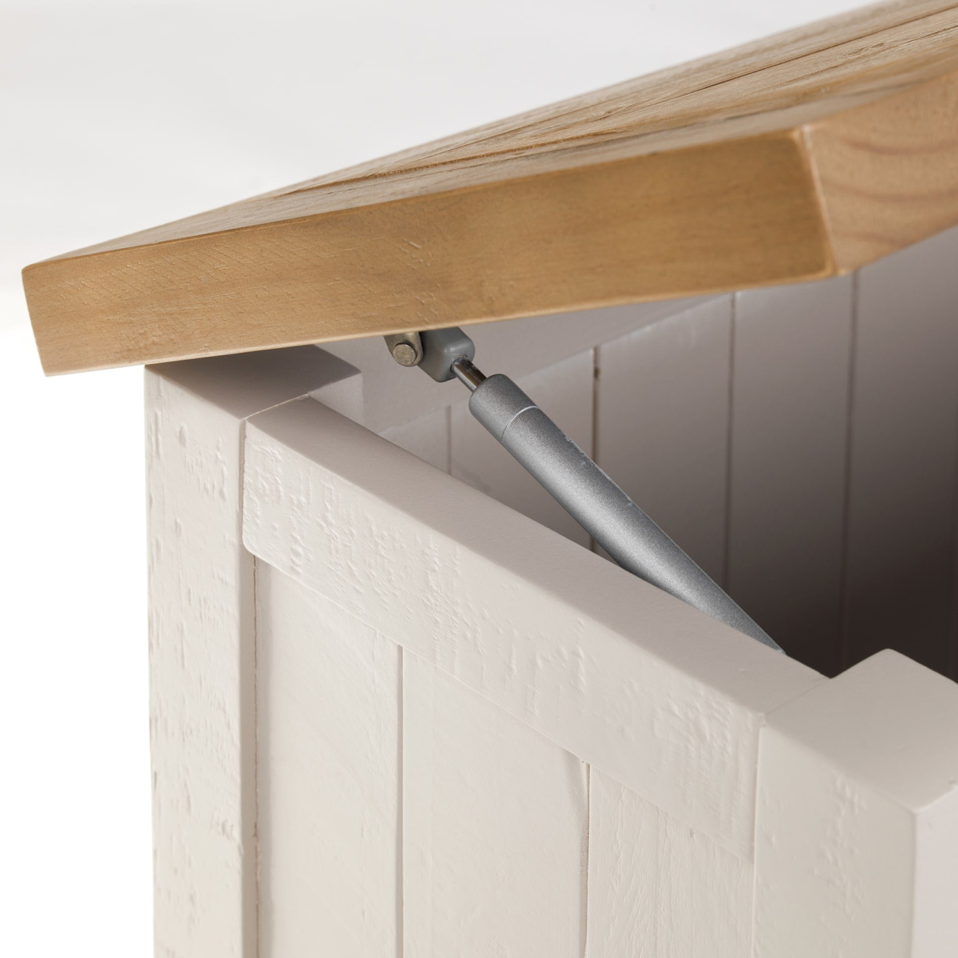 Close look on soft closing piston mechanism of storage bench