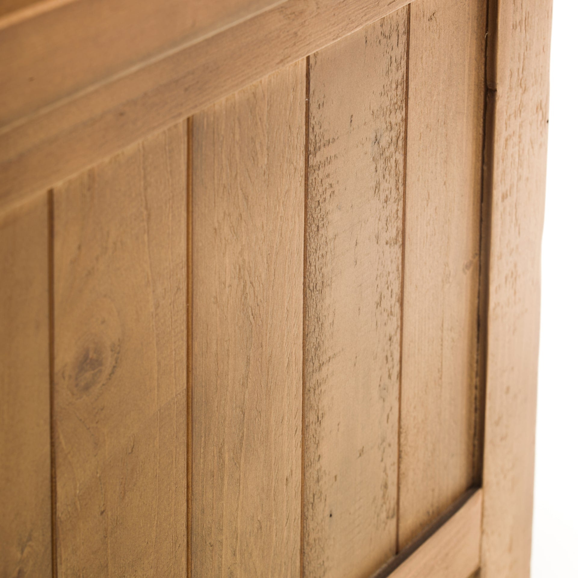 Close up on rough and natural finishes of reclaimed pine wood