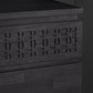 Zoomed look at blind fretwork on top drawer, surfaces of other drawers and the edges.