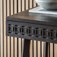 Close-up look at the blind fret work on the front of the drawers and the desk top