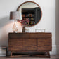 Magnificent brown sideboard with 2 drawers and 3 cupboards of storage is shown in the room setting with decor. The front of the drawers has a stunning frieze of the blind fretwork and the drawers are made with mixed wood veneers put together in a mosaic manner shimmering in the light,. 