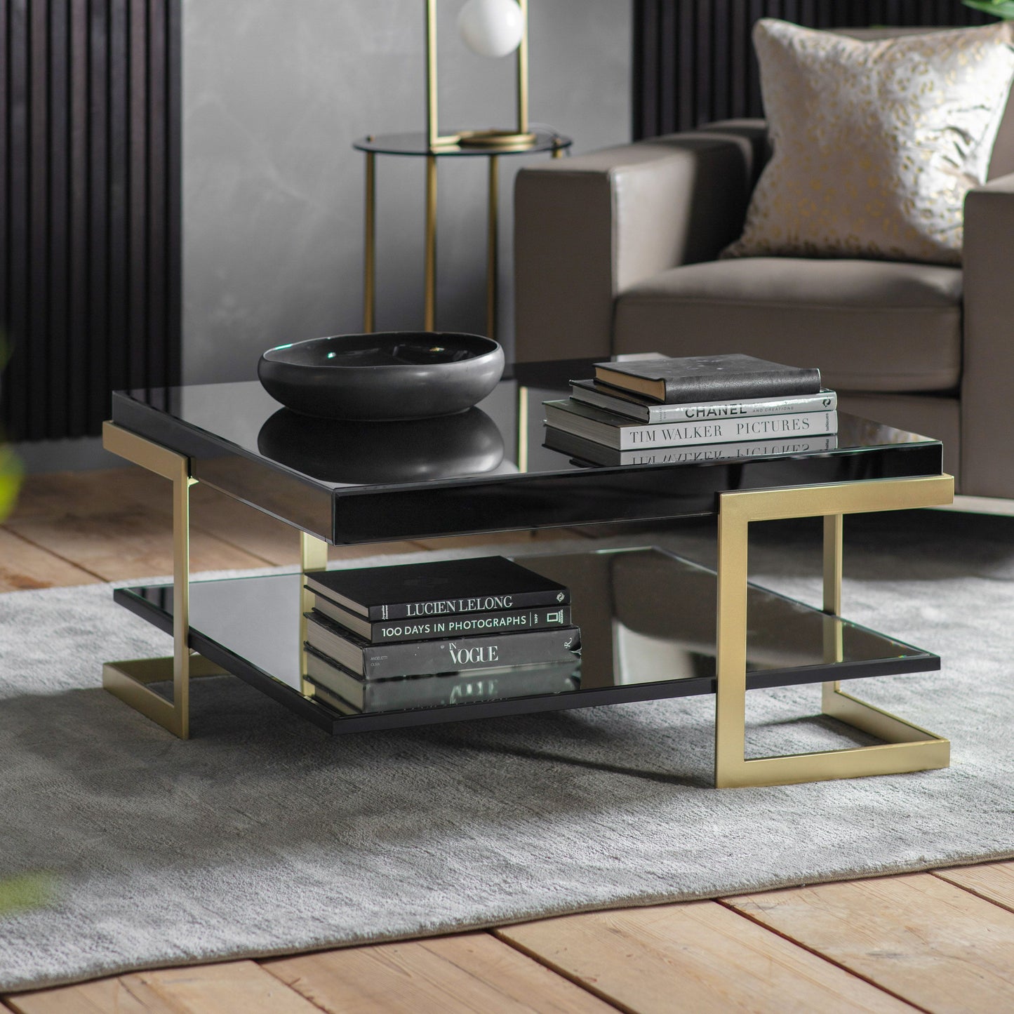 Stunning lux black and gold square coffee table in the room setting